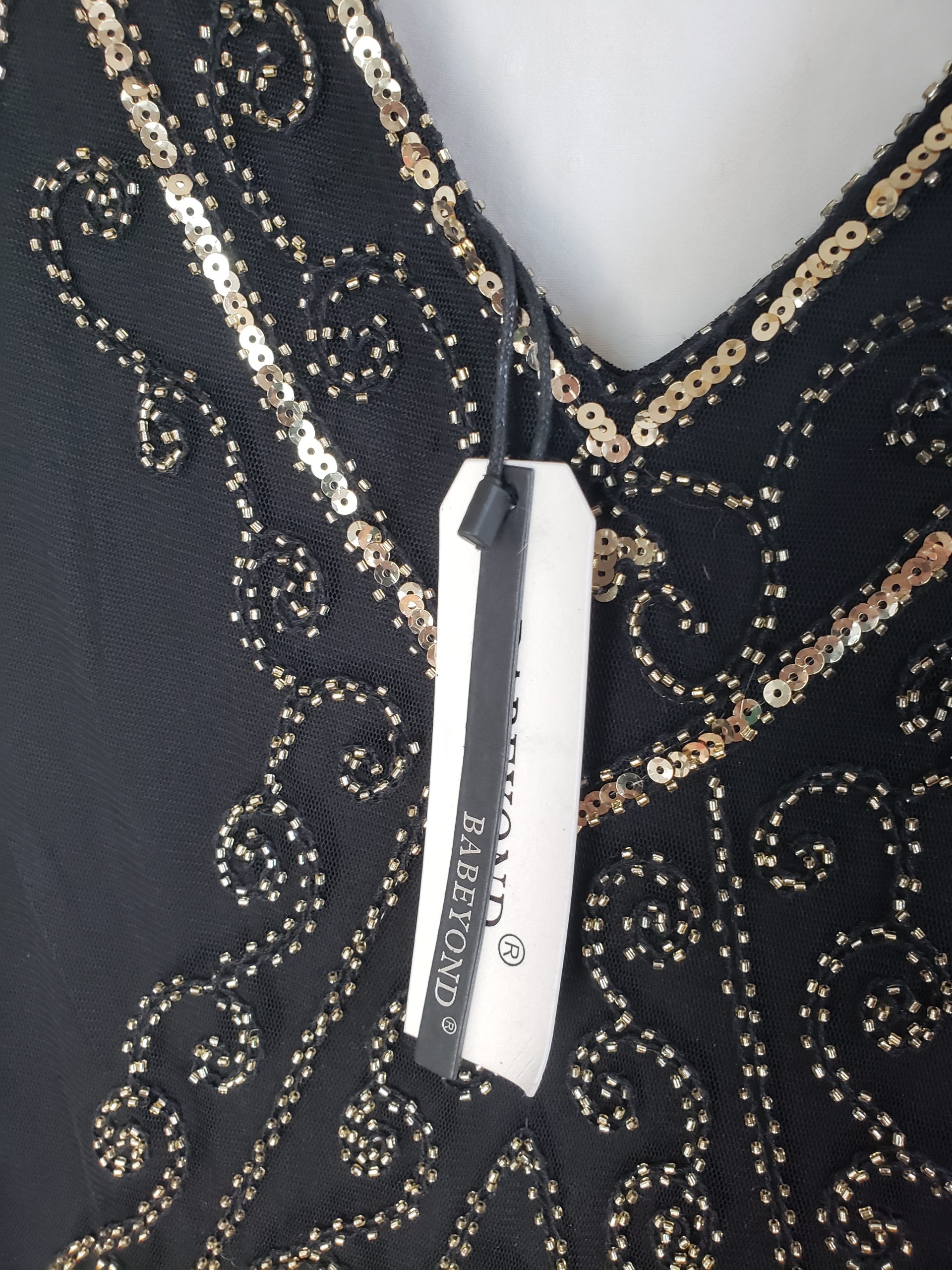 Стильна чорна сукня з вишивкою та бахромою - елегантний винтажний образ у стилі Гетсбі 10 Стильна чорна сукня з вишивкою та бахромою - елегантний винтажний образ у стилі Гетсбі - Зображення 10