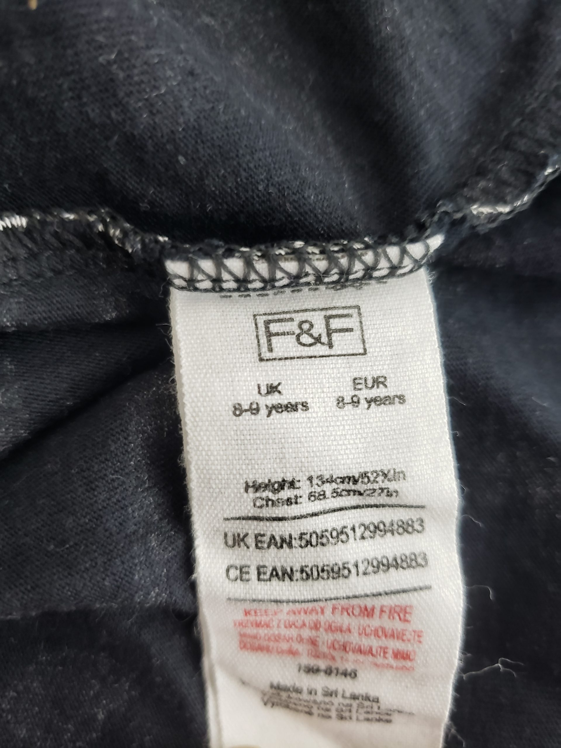 Стильна чорна сукня з принтом для дівчаток 8-9 років - модний тренд дитячої моди 4 Стильна чорна сукня з принтом для дівчаток 8-9 років - модний тренд дитячої моди - Зображення 4