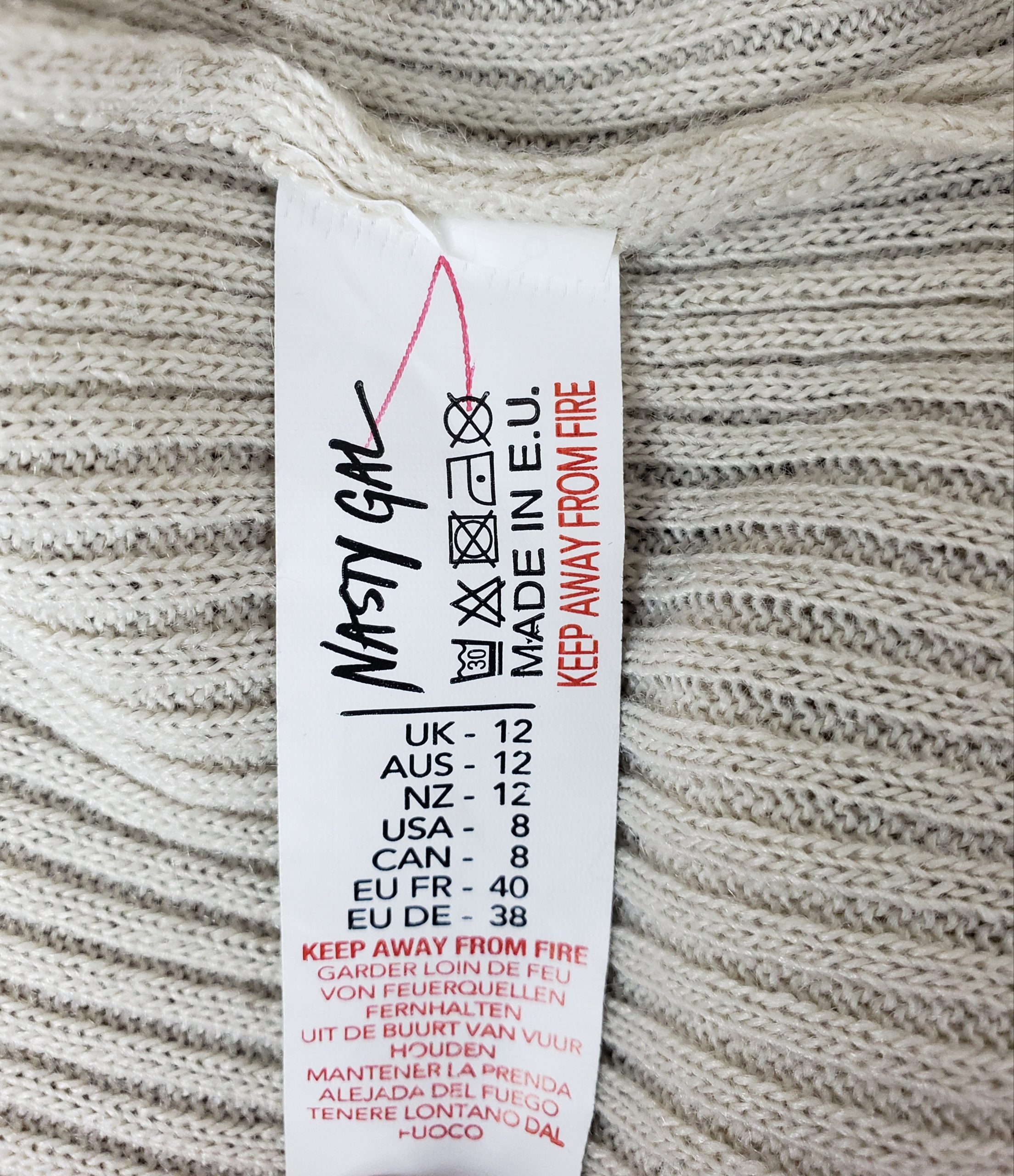 Стильний бежевий кардиган з зав'язками - модний трикотажний топ для елегантного образу 6 Стильний бежевий кардиган з зав'язками - модний трикотажний топ для елегантного образу - Зображення 6