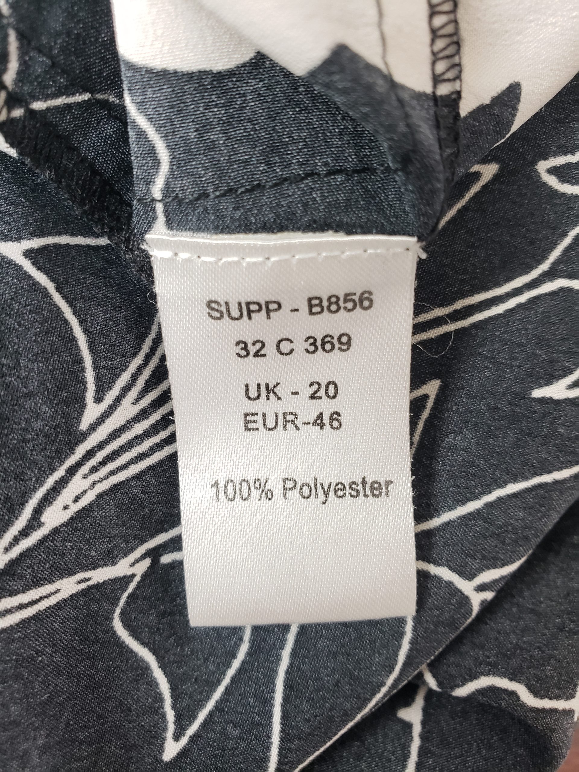 Стильна чорна блуза Together з квітковим принтом - елегантний модний тренд 8 Стильна чорна блуза Together з квітковим принтом - елегантний модний тренд - Зображення 8