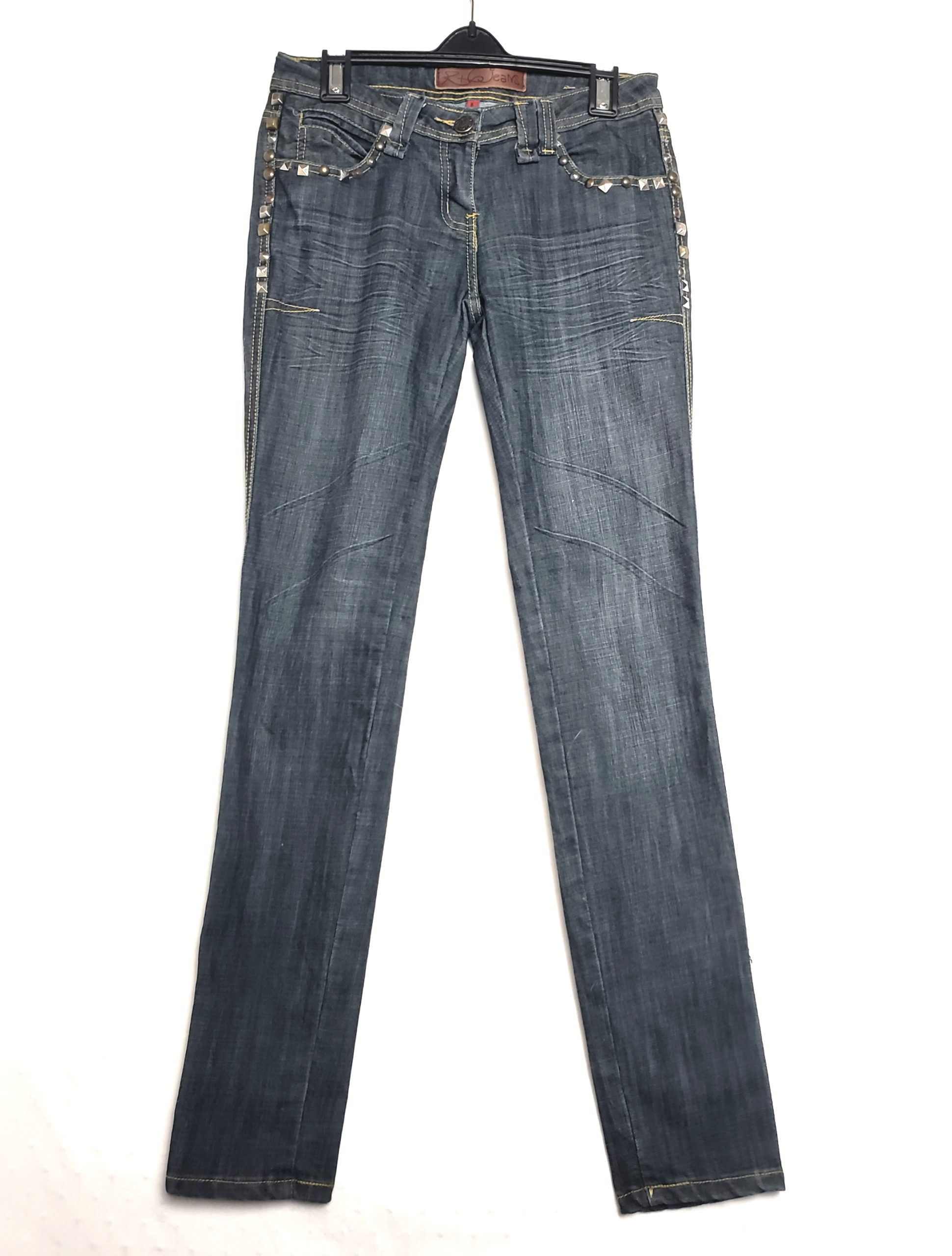 Стильні сині джинси з металевими заклепками - елегантний vintage look для модних жінок 1 Стильні сині джинси з металевими заклепками - елегантний vintage look для модних жінок