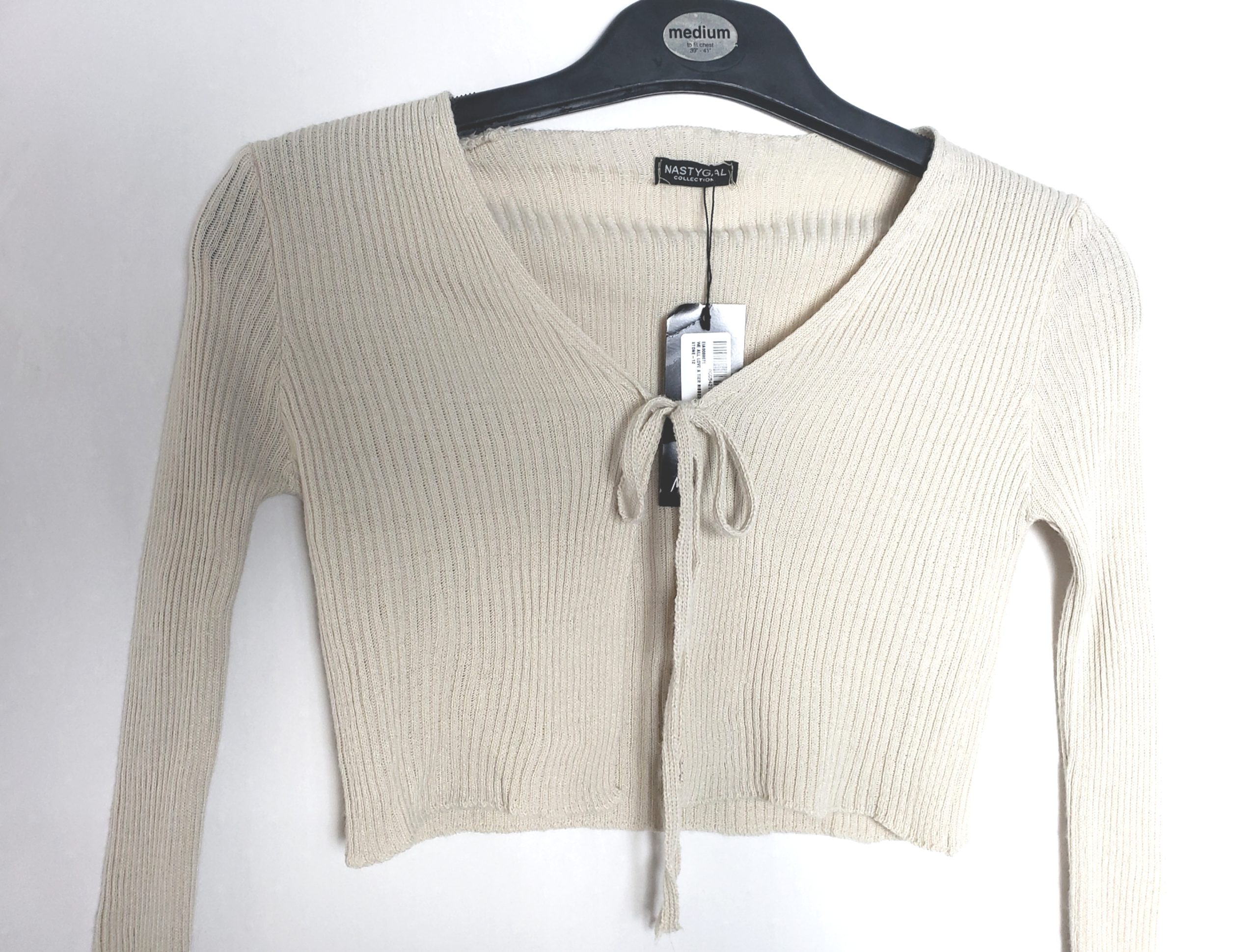 Стильний бежевий кардиган з зав'язками - модний трикотажний топ для елегантного образу 3 Стильний бежевий кардиган з зав'язками - модний трикотажний топ для елегантного образу - Зображення 3