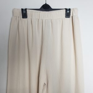 Бежеві широкі штани з поліестеру CIDER - вживаний одяг в ідеальному стані