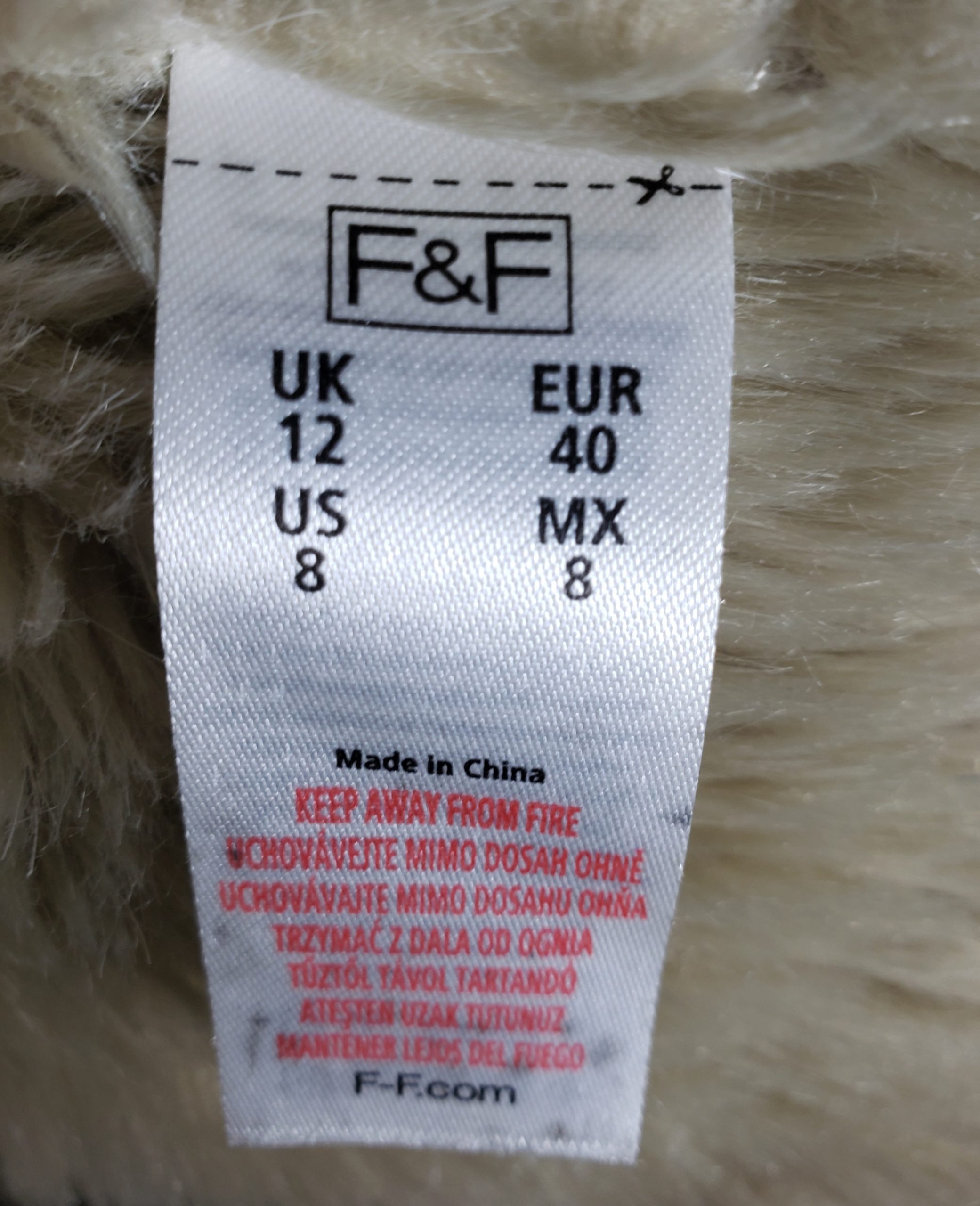 Коричнева куртка з хутряним коміром - стильний верхній одяг для осені та зими 9 Коричнева куртка з хутряним коміром - стильний верхній одяг для осені та зими - Зображення 9