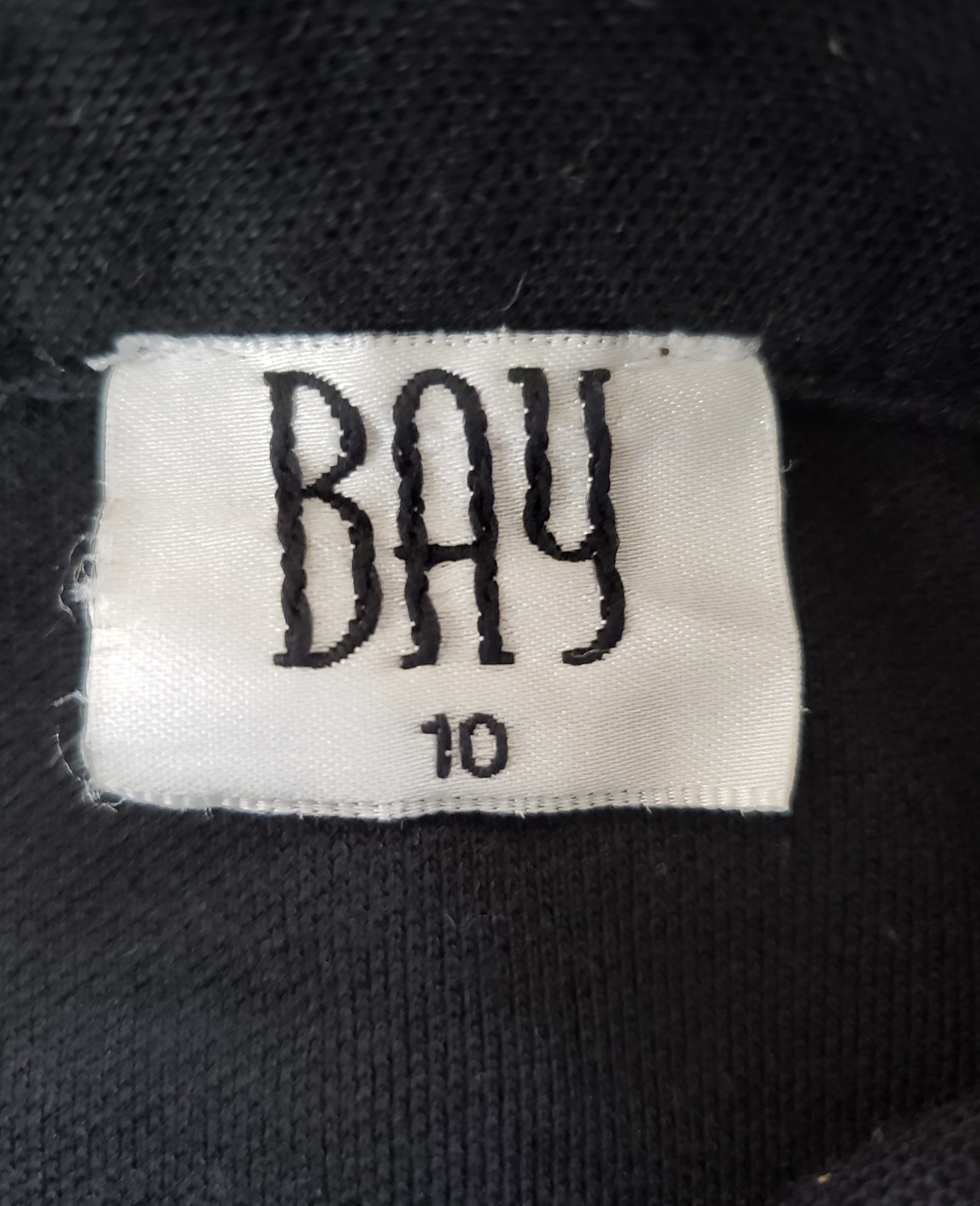 Чорне поло для дівчинки 10 років - ідеальний базовий елемент гардеробу для школи та відпочинку 8 Чорне поло для дівчинки 10 років - ідеальний базовий елемент гардеробу для школи та відпочинку - Зображення 8