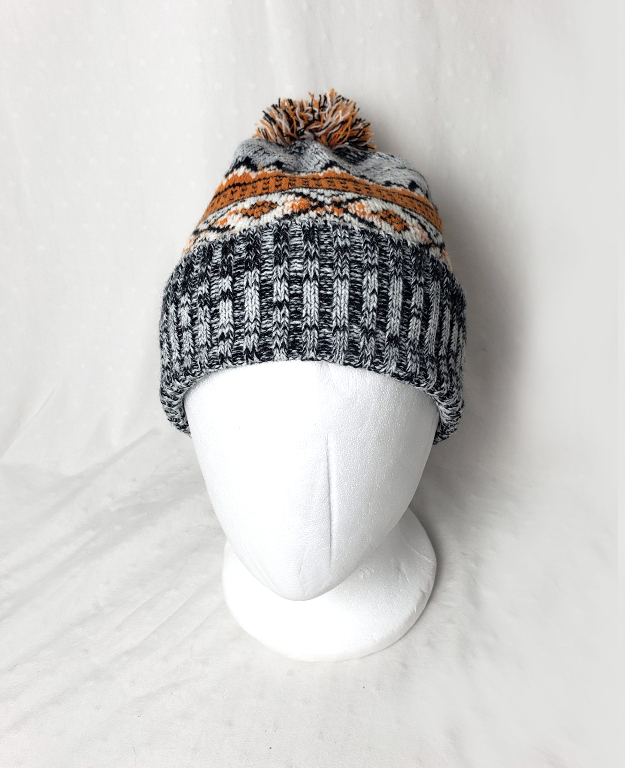 Стильна акрилова шапка з помпоном - зимовий аксесуар для щоденного носіння 1 Стильна акрилова шапка з помпоном - зимовий аксесуар для щоденного носіння