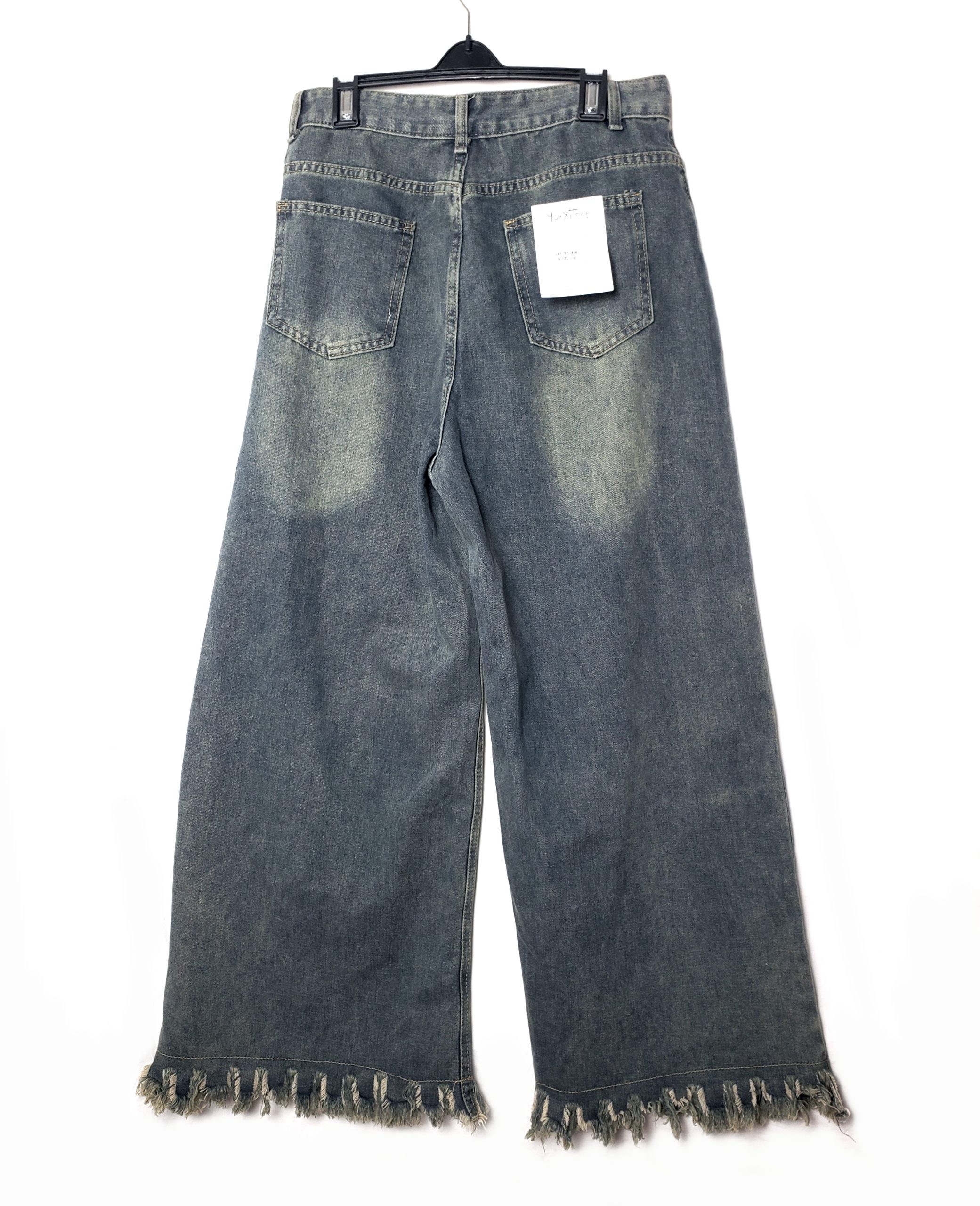 Широкі джинси кюлоти з бахромою - стильні джинси для повсякденного носіння та модних образів 5 Широкі джинси кюлоти з бахромою - стильні джинси для повсякденного носіння та модних образів - Зображення 5